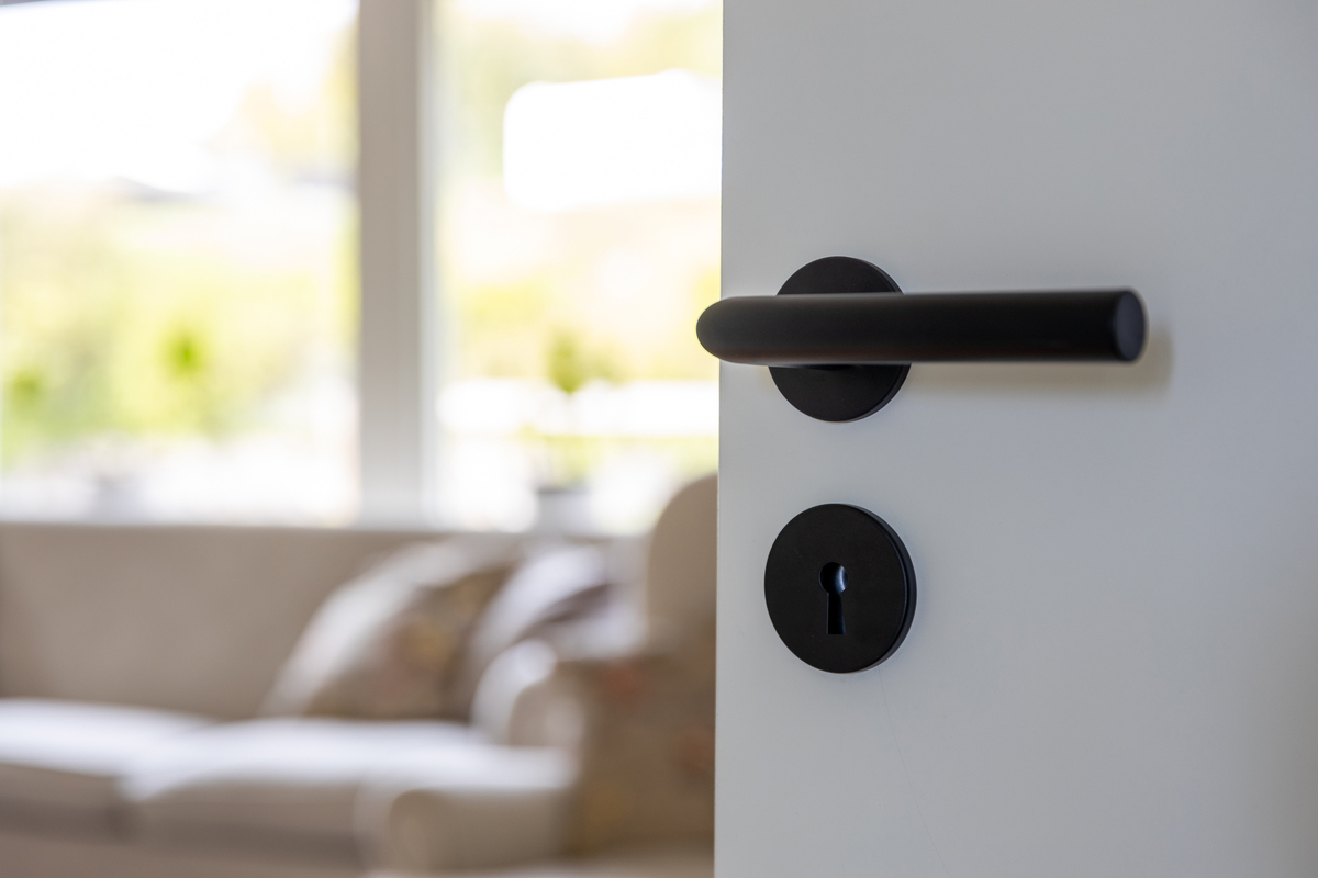 Väliovenpainike Portland musta